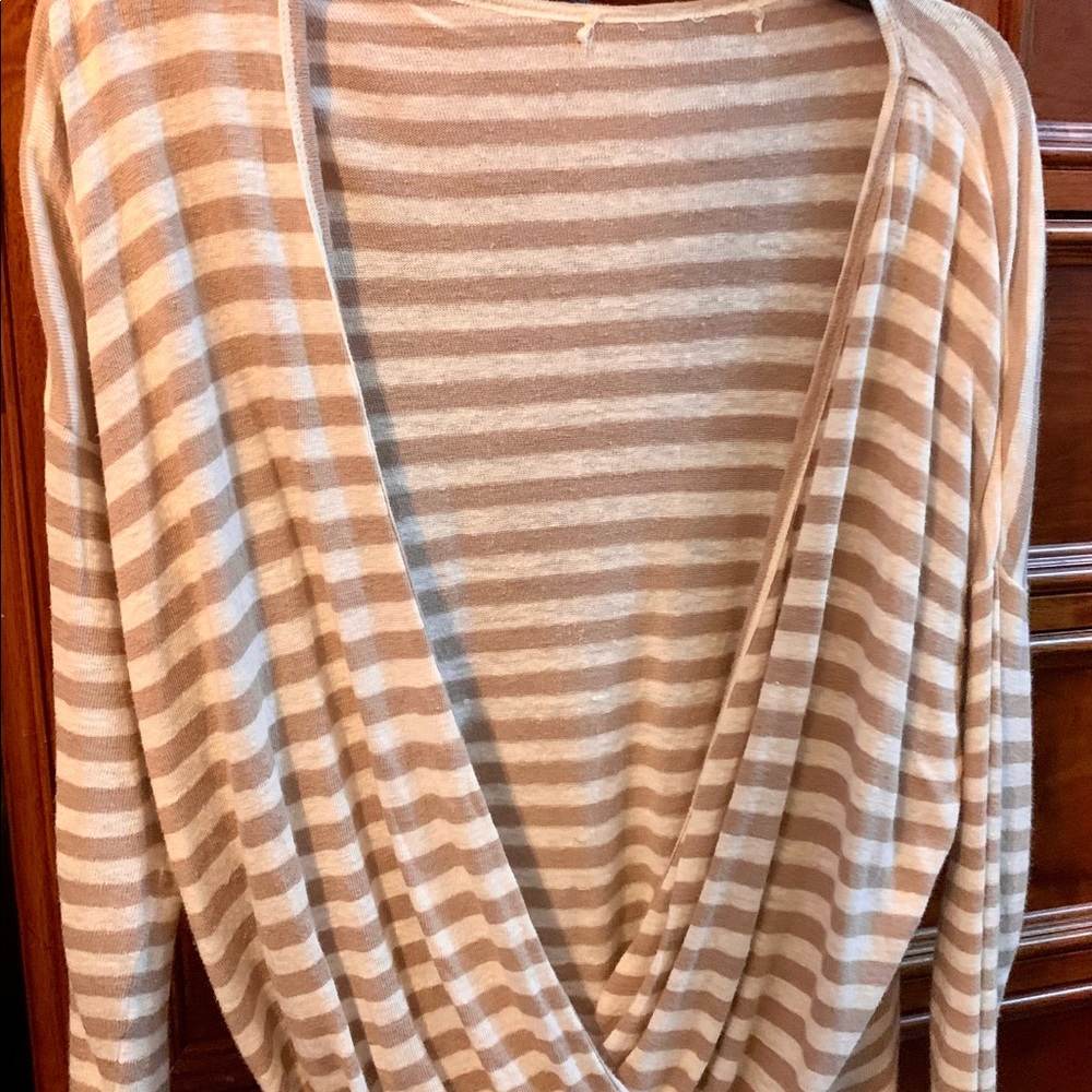 Tan/White stripe cross over top; brand not sure and tag removed.